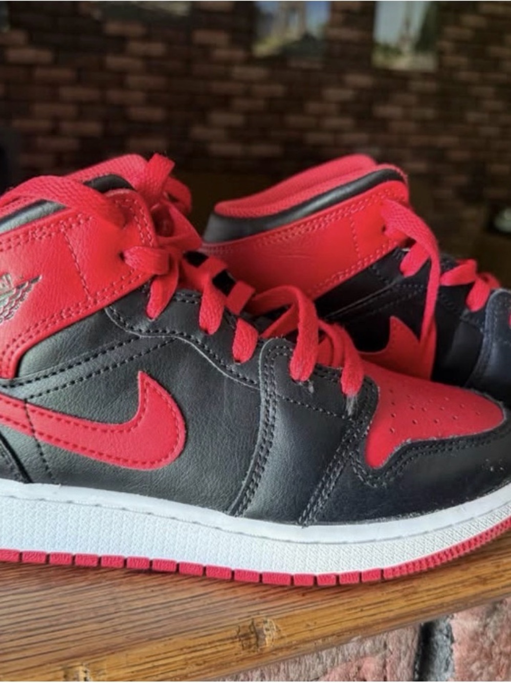 Jordans Kids High-Top Athletic Sneakers in Black and Red